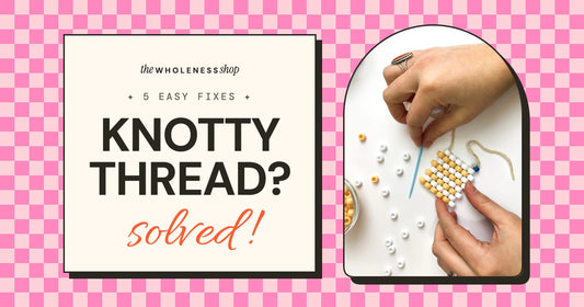 Hands stitching big beads with a needle and thread next to the words Knotty thread? Solved!
